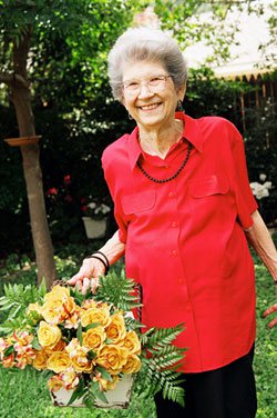Elderly Lady with Flower Basket